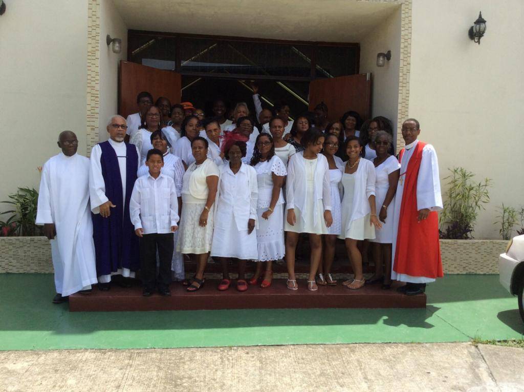 UECCC congregation in white during a special service